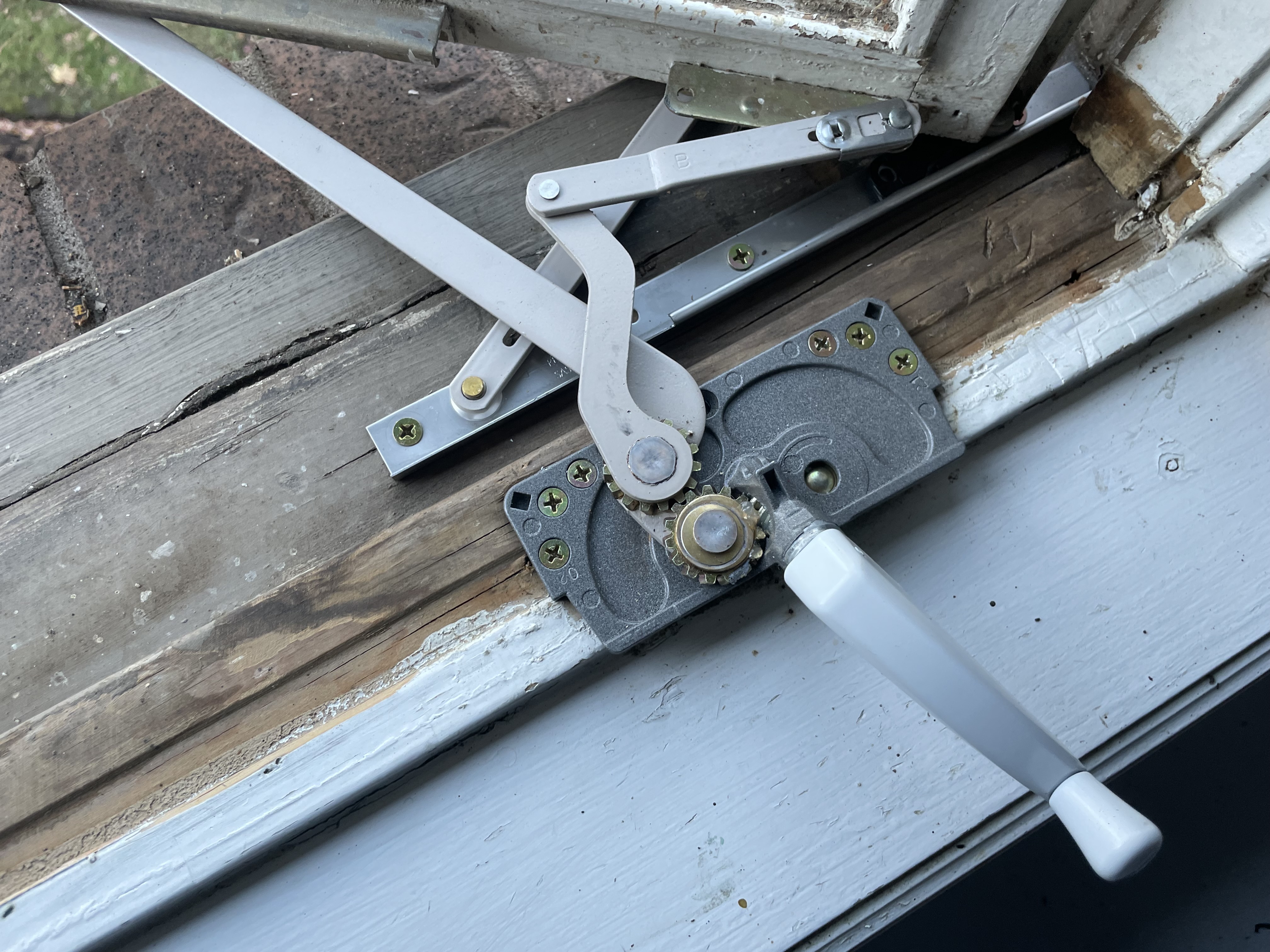 Window hardware repair in Hamilton, featuring crank replacement by Window Fix GTA.